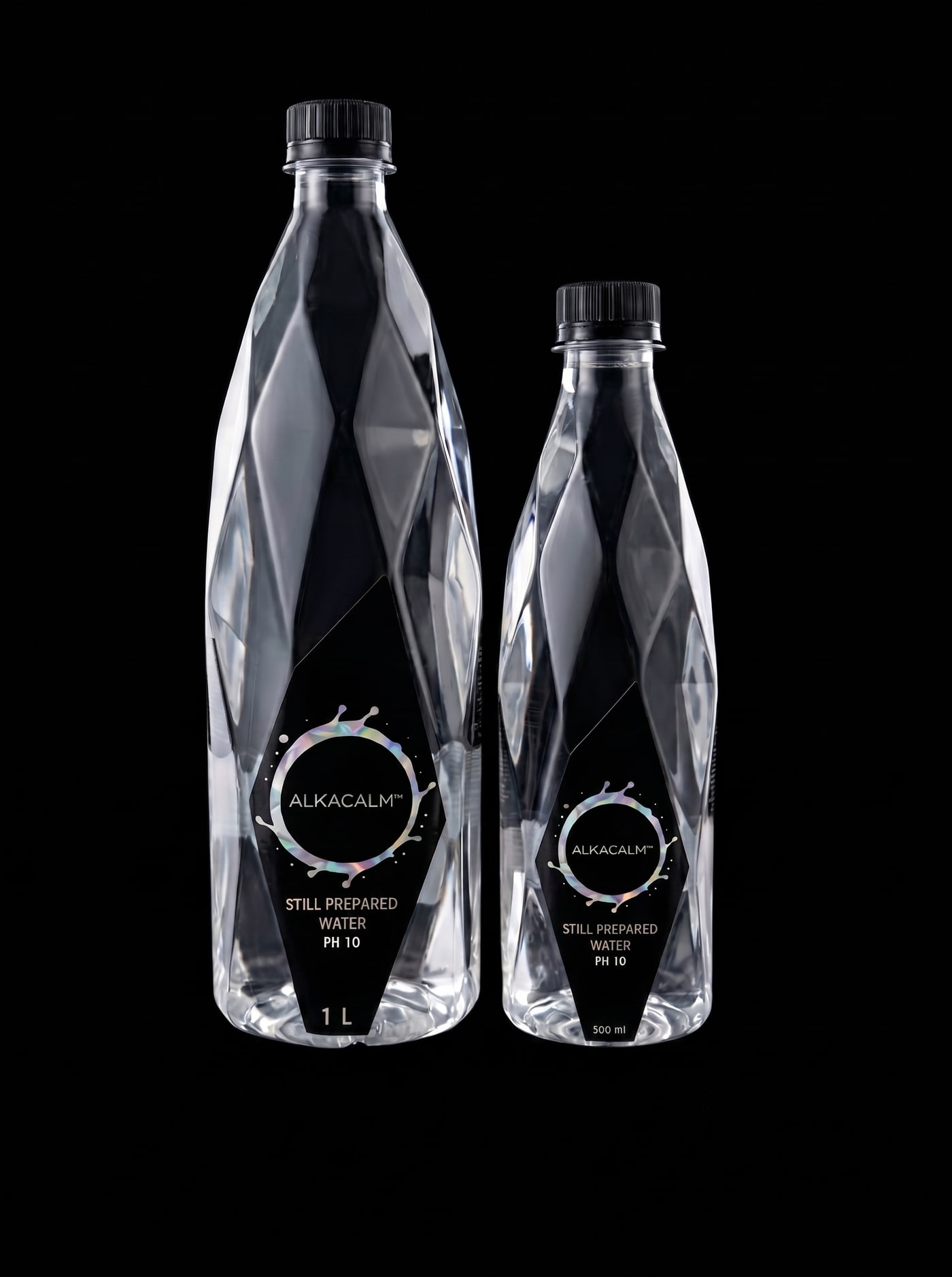ALKACALM 1 litre and 500 ml still prepared water, pH 10 — diamond-faceted crystal bottles